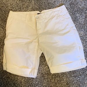 White Bermuda roll cuff shorts